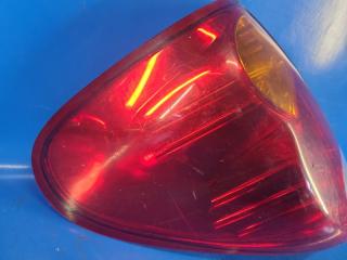 Фонарь наружный левый L200 06-14