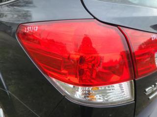 Фонарь наружный левый OUTBACK 09-14 BR