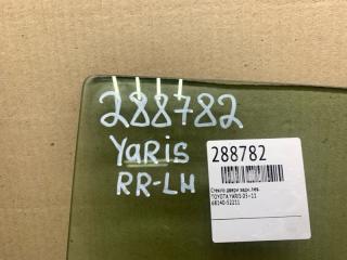 Стекло двери заднее левое YARIS 05–11