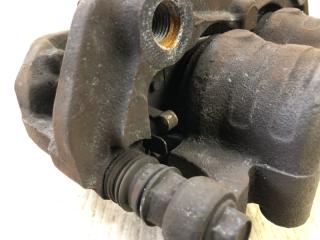 Суппорт тормозной передний левый NV200 USA 13- 2013 2.0 MR20DE