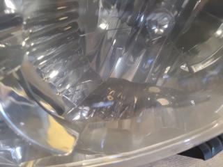 Фара левая COROLLA 150 06-13