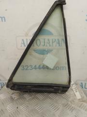 Стекло двери глухое заднее левое MAZDA 323 BJ 98-2003