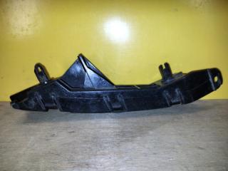 Кронштейн переднего бампера левый L200 06-14