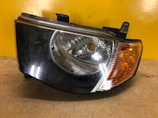 Фара левая MITSUBISHI L200 06-14