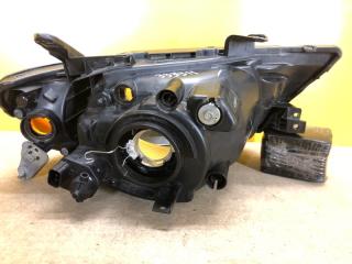 Фара левая L200 06-14