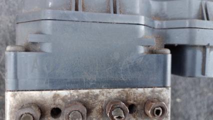 Блок ABS L200 06-14