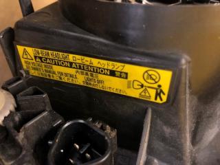 Фара левая AVENSIS 03-08