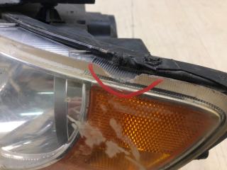 Фара левая GRANDEUR 05-11 TG