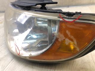 Фара левая GRANDEUR 05-11 TG